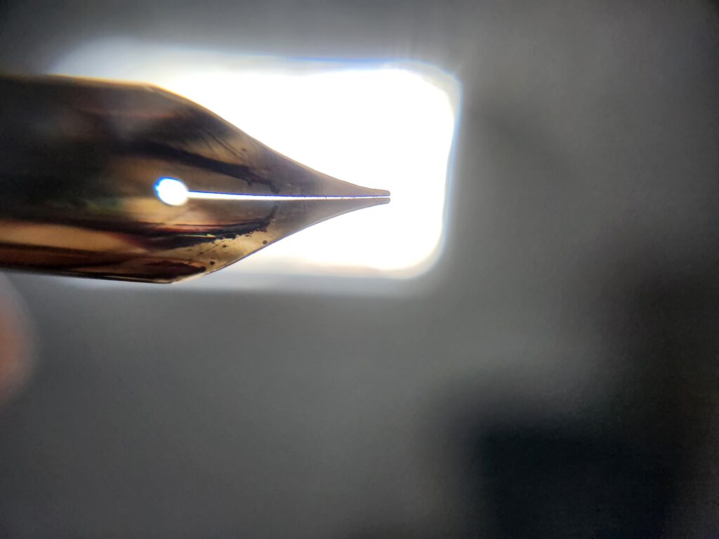 What I like a nib slit to look like; before adjustment, the tines were pressed tightly together and no light passed between them